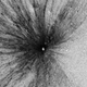 Processed image showing debris flung far and wide from a lunar impact crater. Image: NASA/GSFC/ASU